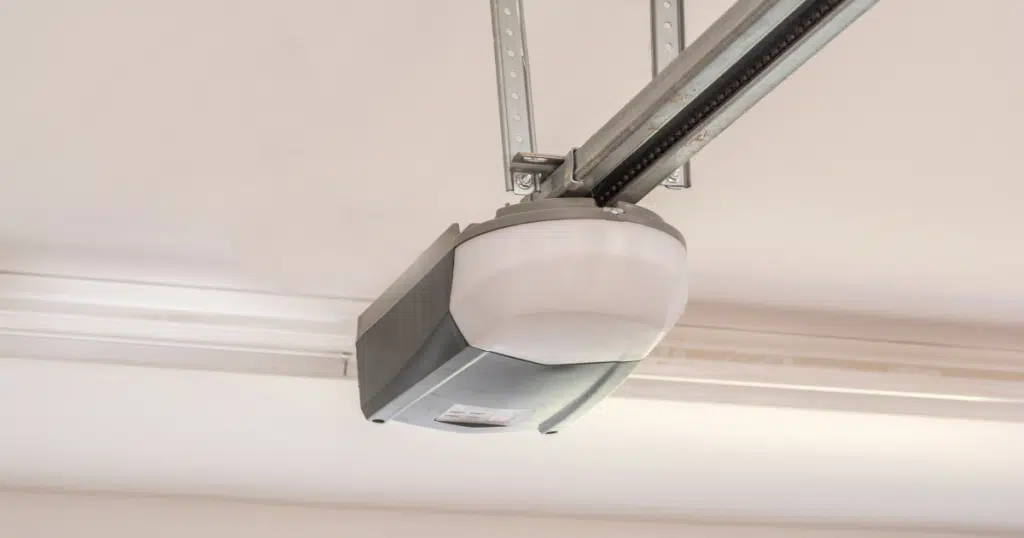 Ceiling-mounted garage door opener in focus.