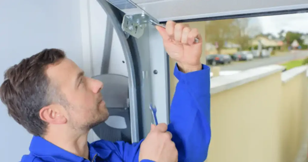 expert changing garage door cable